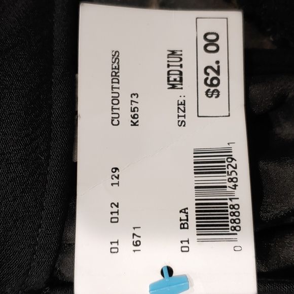 A Hippie Love LBD with cutouts and silver chain detail from Vanilla Sky Medium - Picture 10 of 11